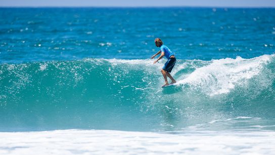 Tommy Coleman of United States wins his first long board contest in Huntington Beach, CA.
