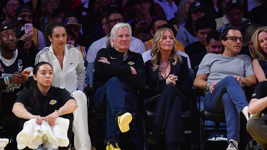 Lakers owner Mark Walter with Jeannie Buss at a game.