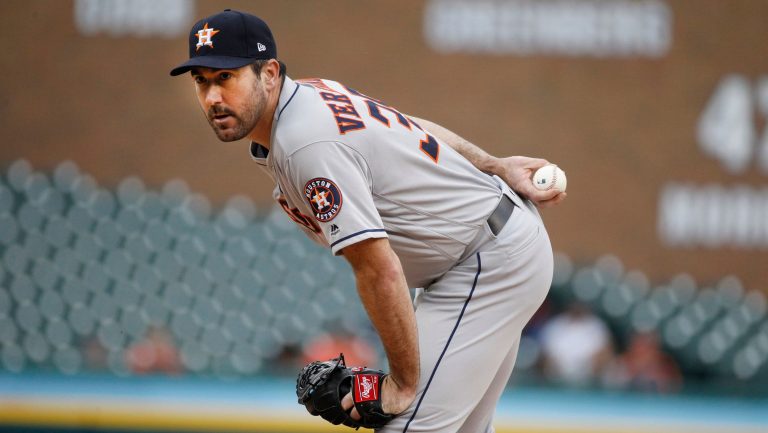 Astros pitcher Justin Verlander eyes up Tigers right fielder Nicholas Castellanos before pitching to him in the first inning on