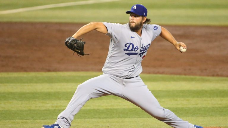 Los Angeles Dodgers pitcher Clayton Kershaw throws against the Arizona Diamondbacks during the third inning at Chase Field