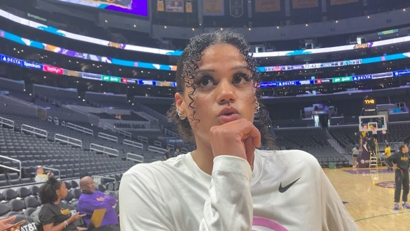 Rae Burrell ponders during a game pause.