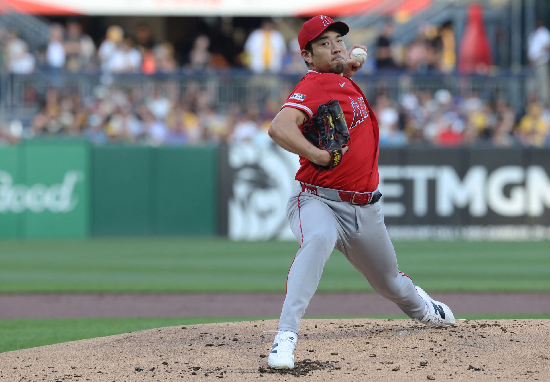 Yusei Kikuchi pitches against the Pirates during the first inning at PNC Park.