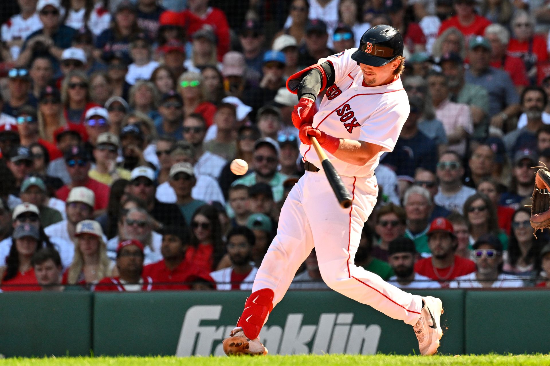 Adley Rutschman hits a three-run homer in the second inning at Fenway.