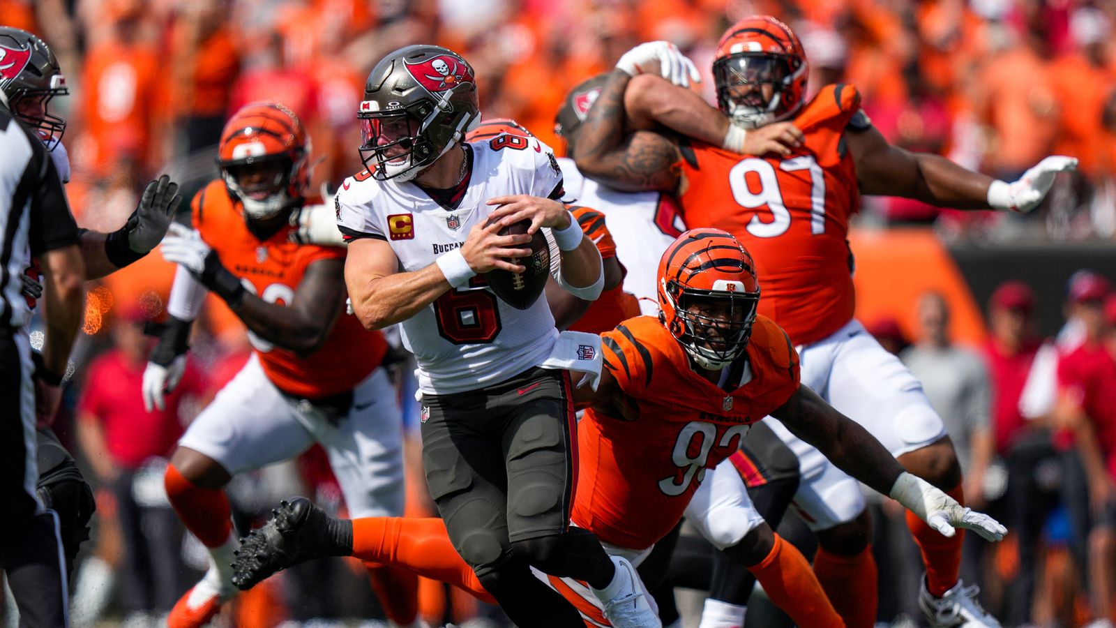 Jonathan Allen tackles Baker Mayfield in a tight NFL clash.
