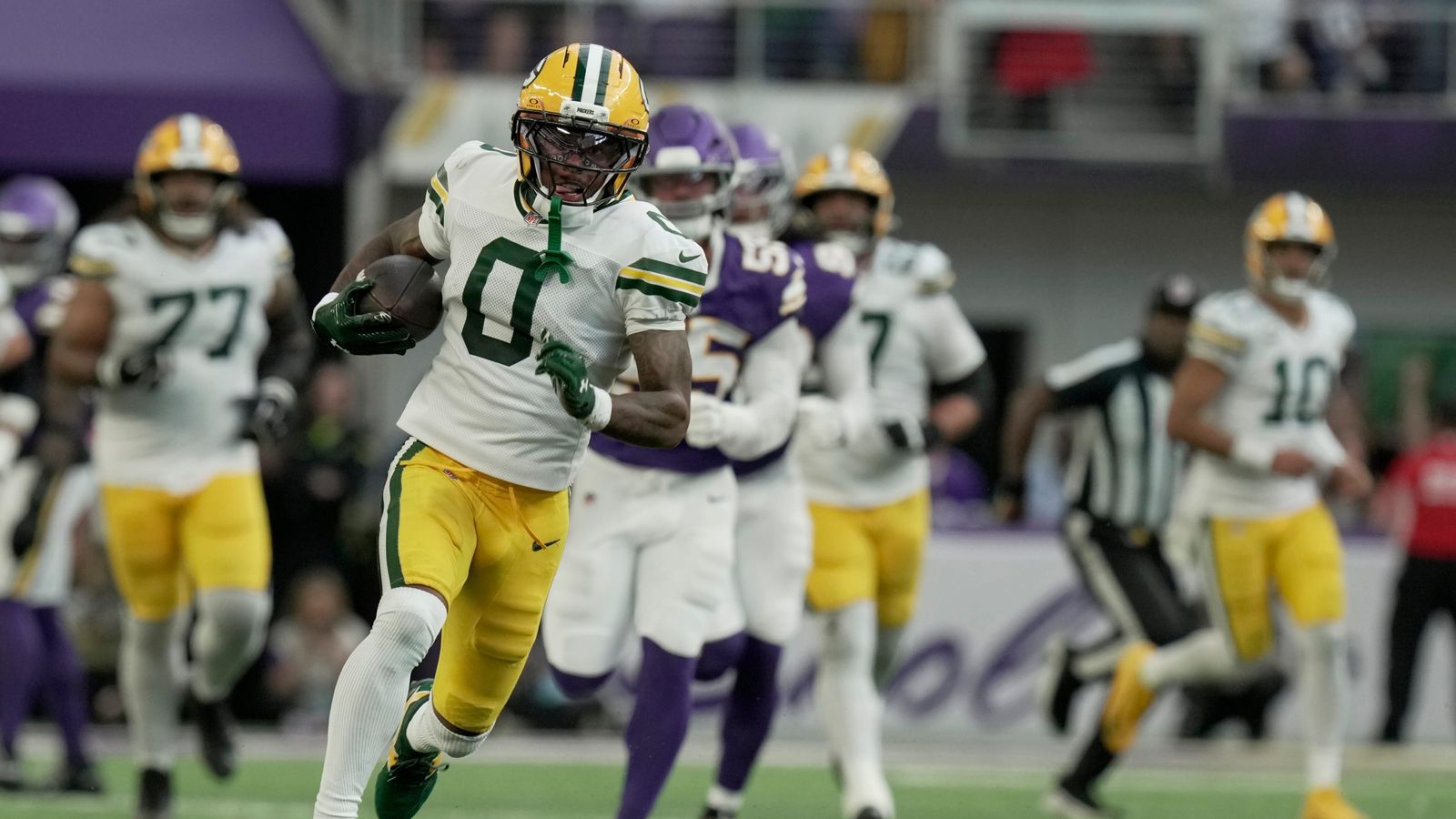 Matthew Golden secures a 42-yard catch against the Vikings.