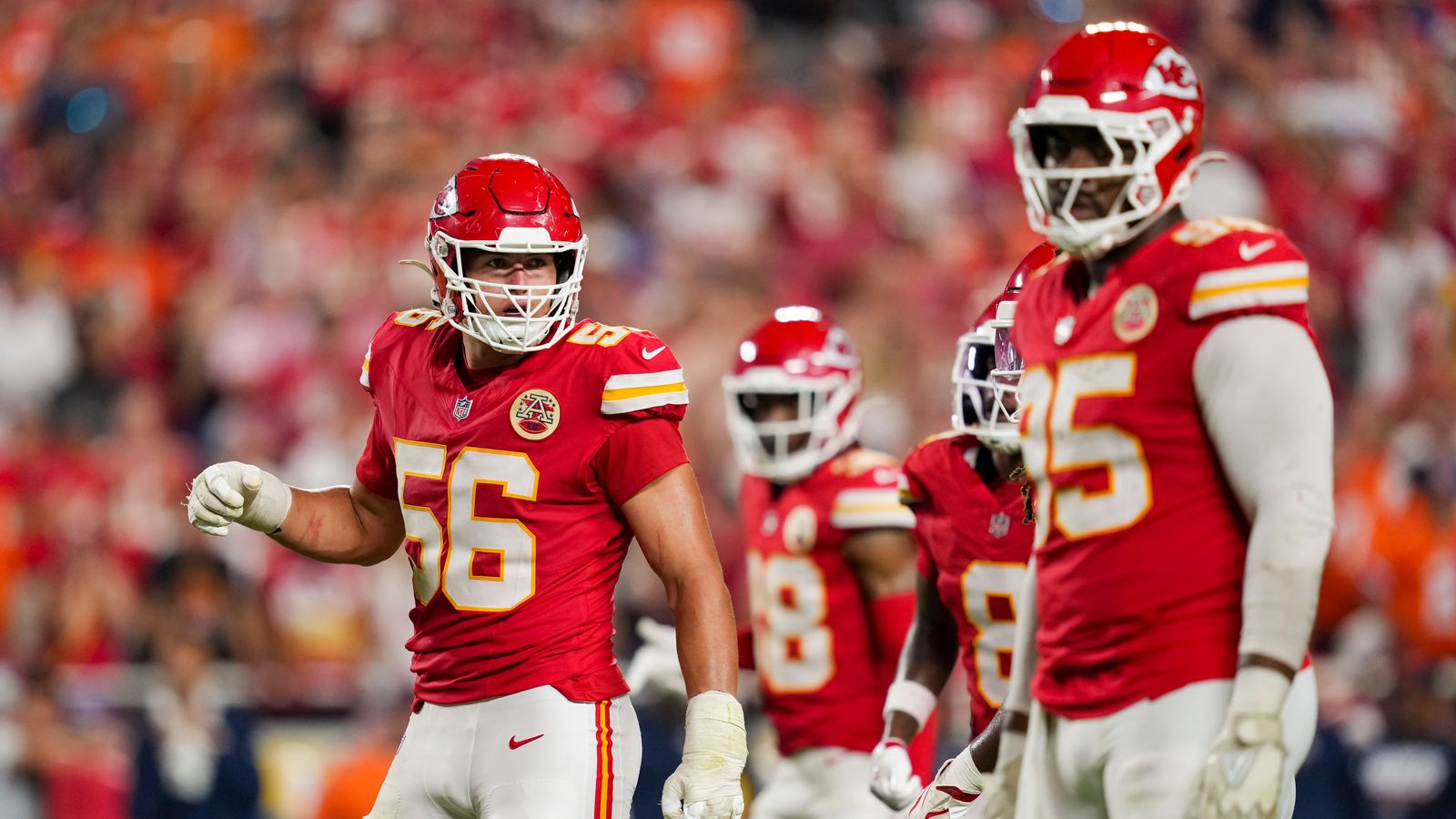 George Karlaftis celebrates a play against the Broncos.