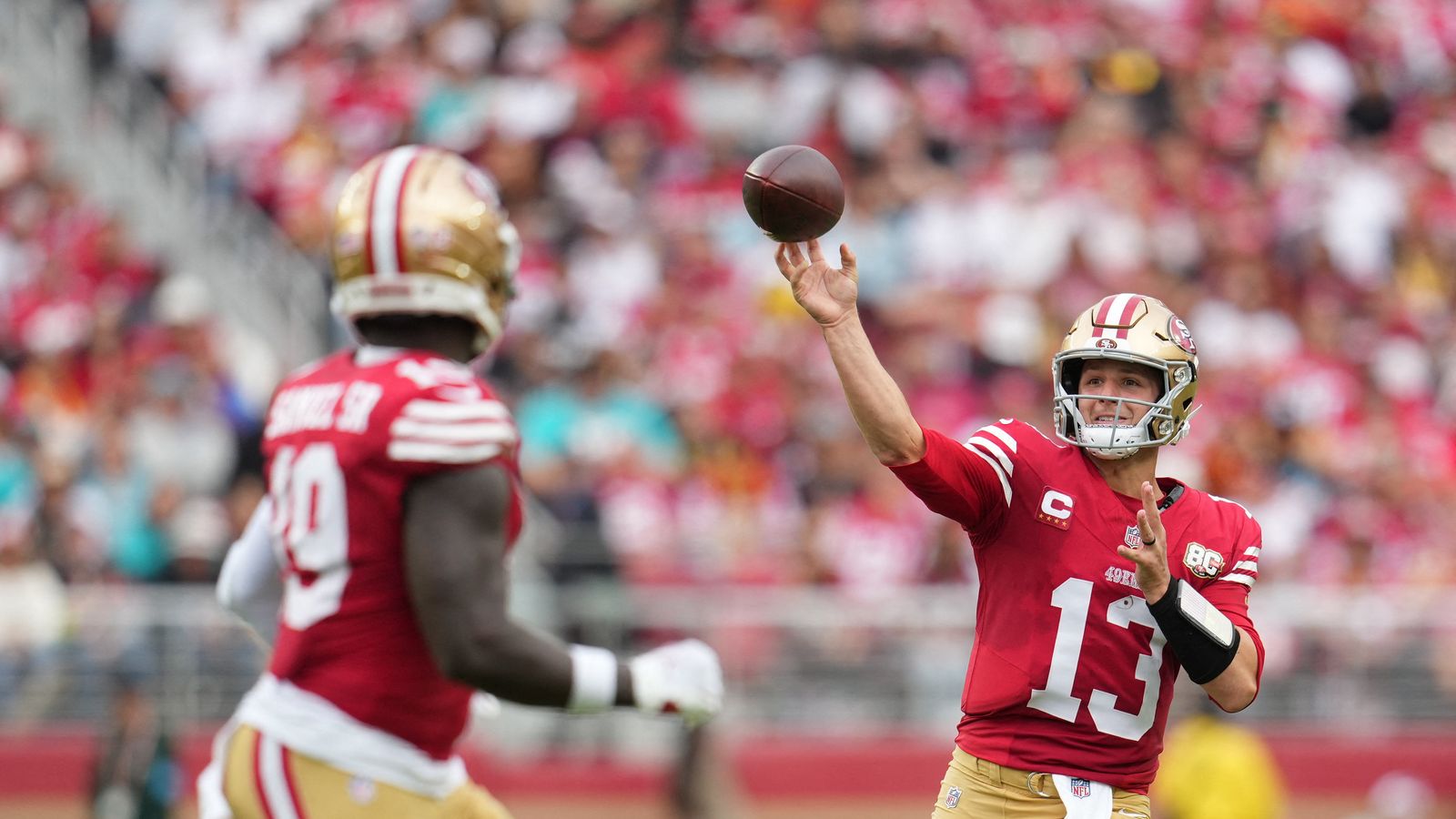 Brock Purdy passes during a game against the Dolphins at Levi's Stadium.
