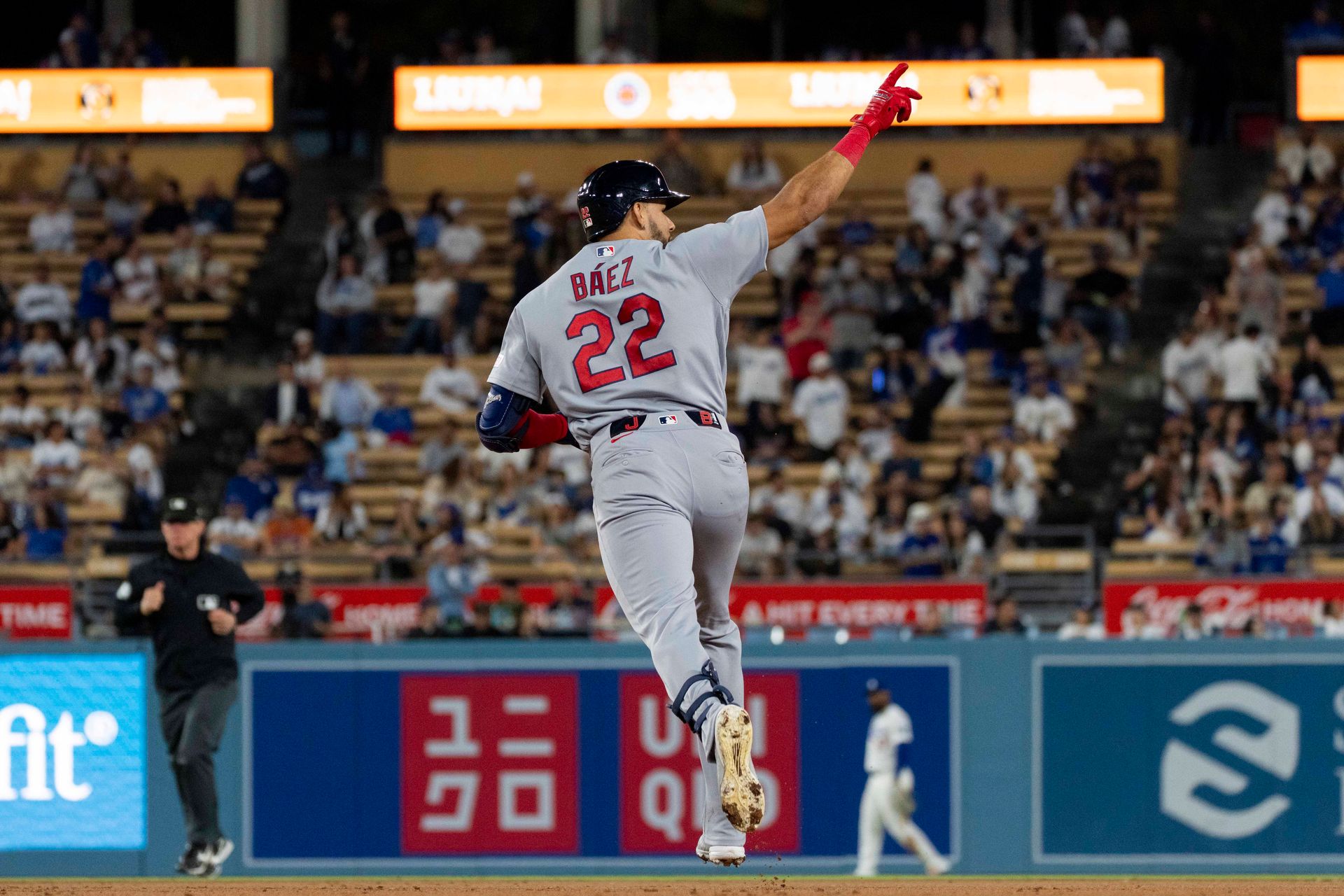 Joshua Baez celebrates his home run for the Cardinals