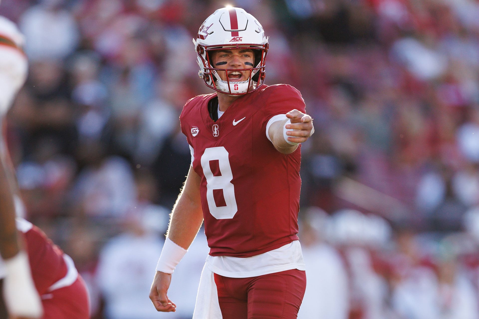 Davis Warren #8 signals during Miami vs. Stanford game