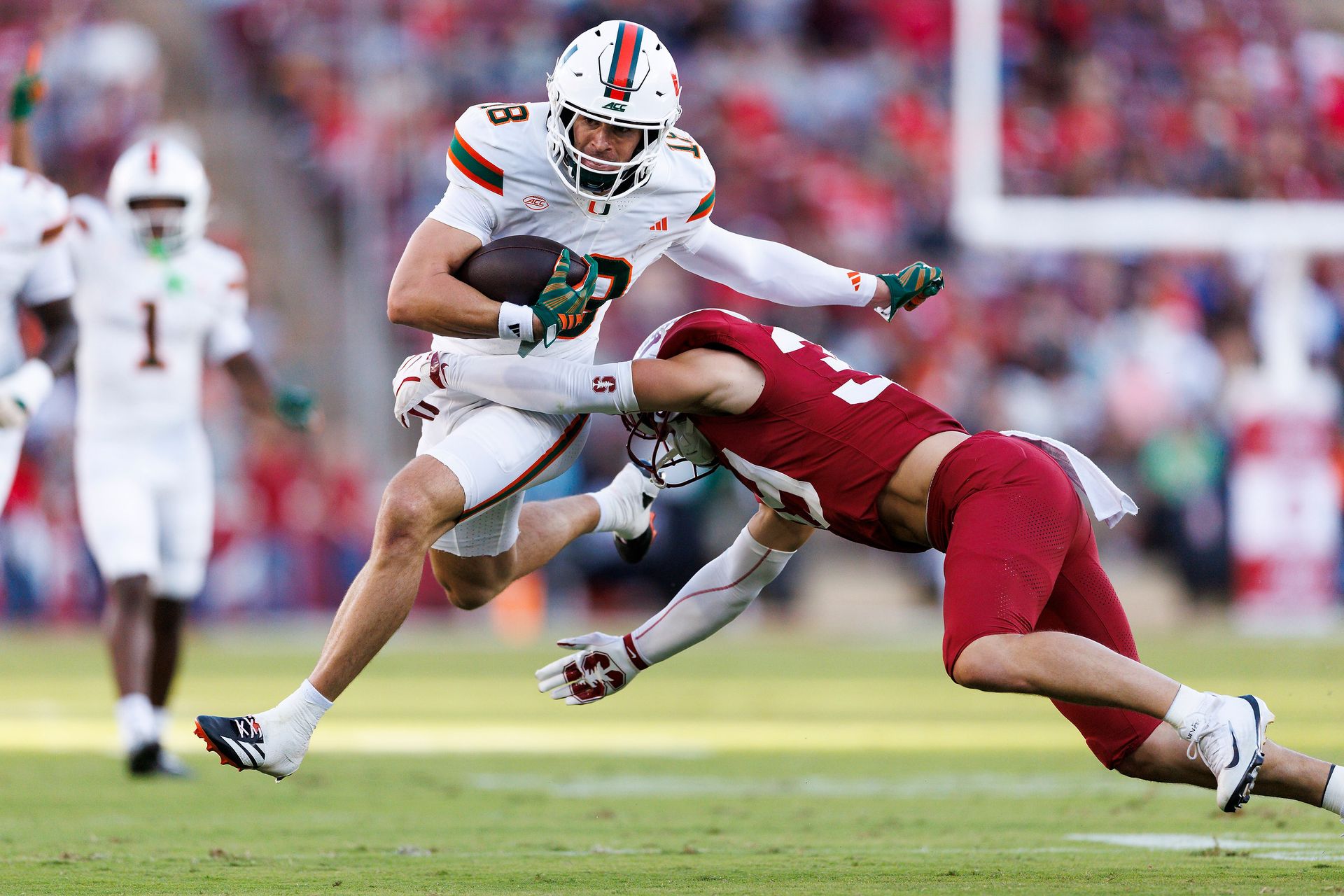 Cooper Barkate #18 runs after catch at Stanford Stadium