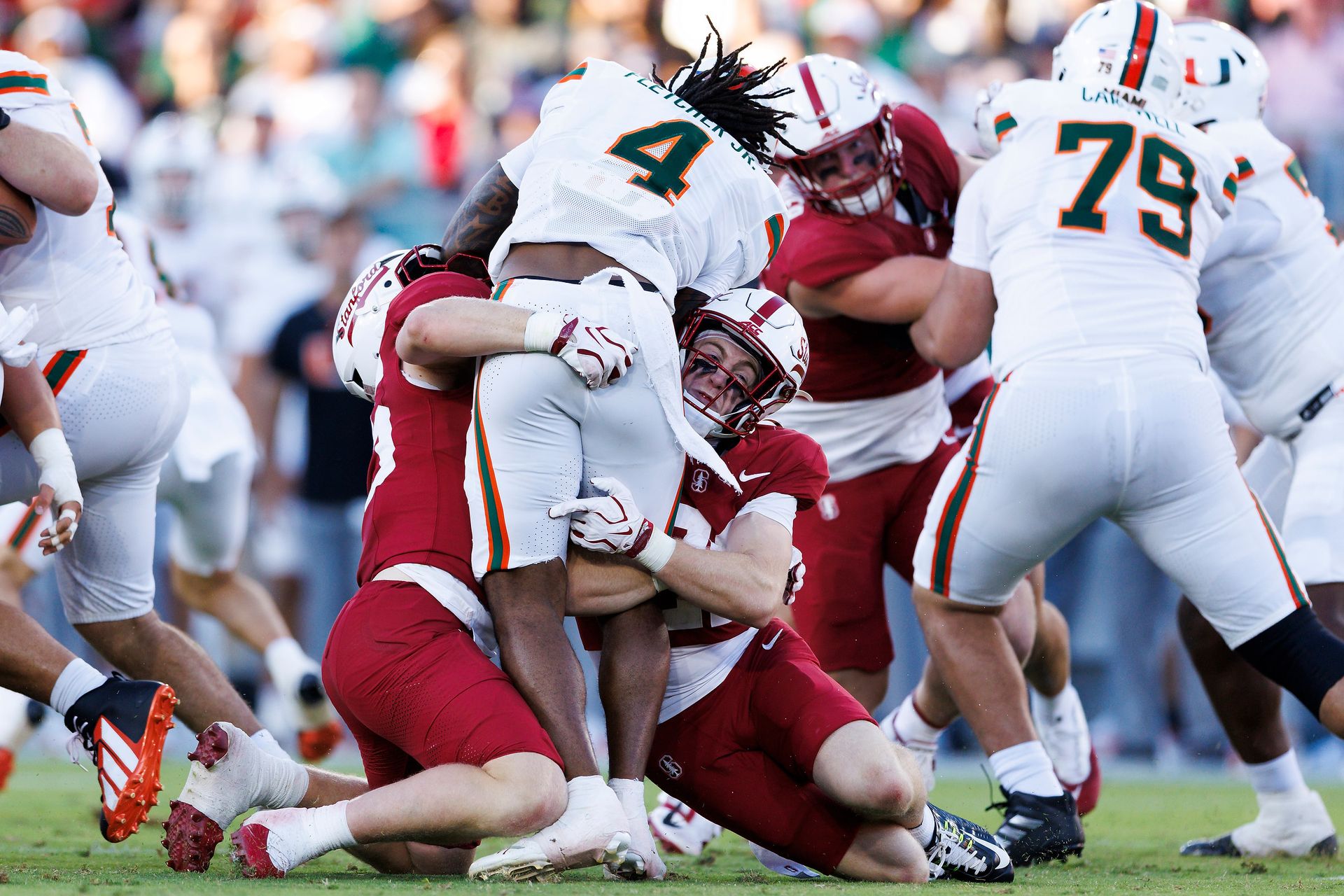 Mark Fletcher Jr. #4 tackled in game against Stanford
