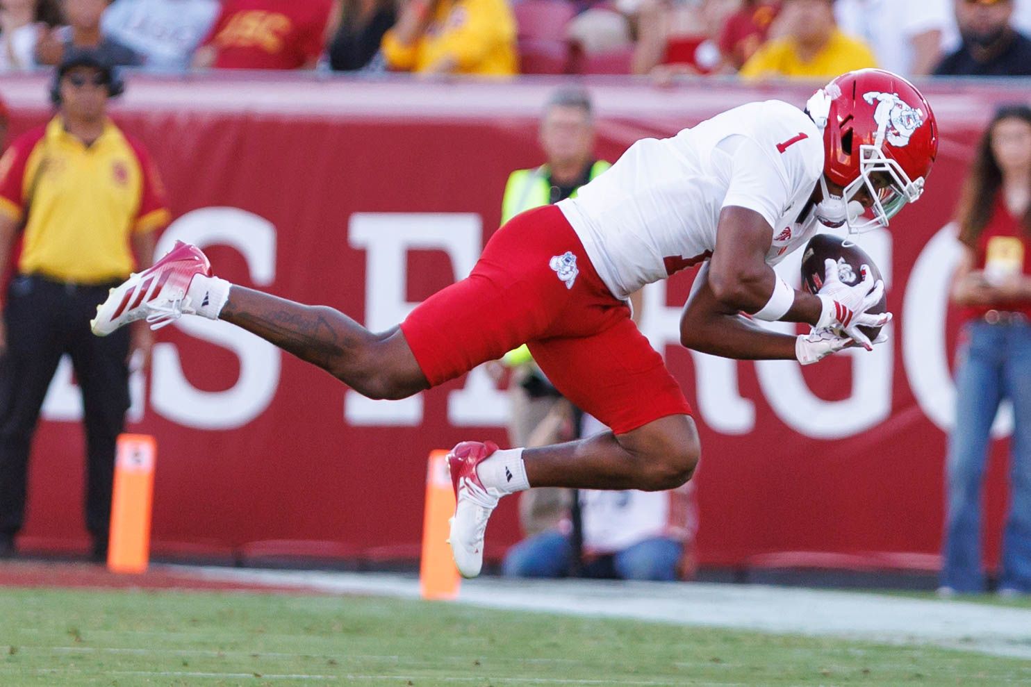 K'vion Thunderbird makes a leap for a catch against USC
