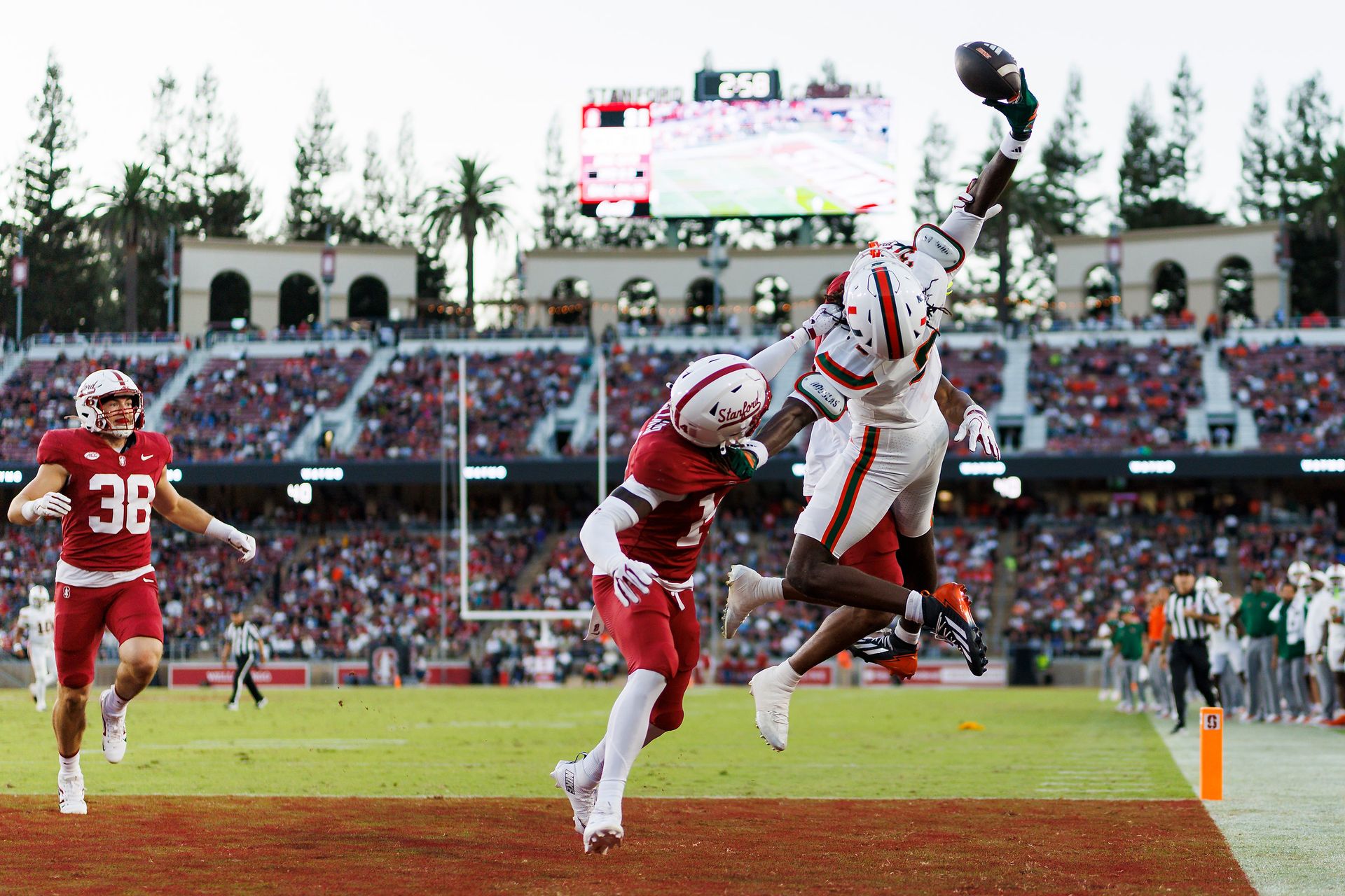 Joshua Moore #3 jumps for the ball against Stanford