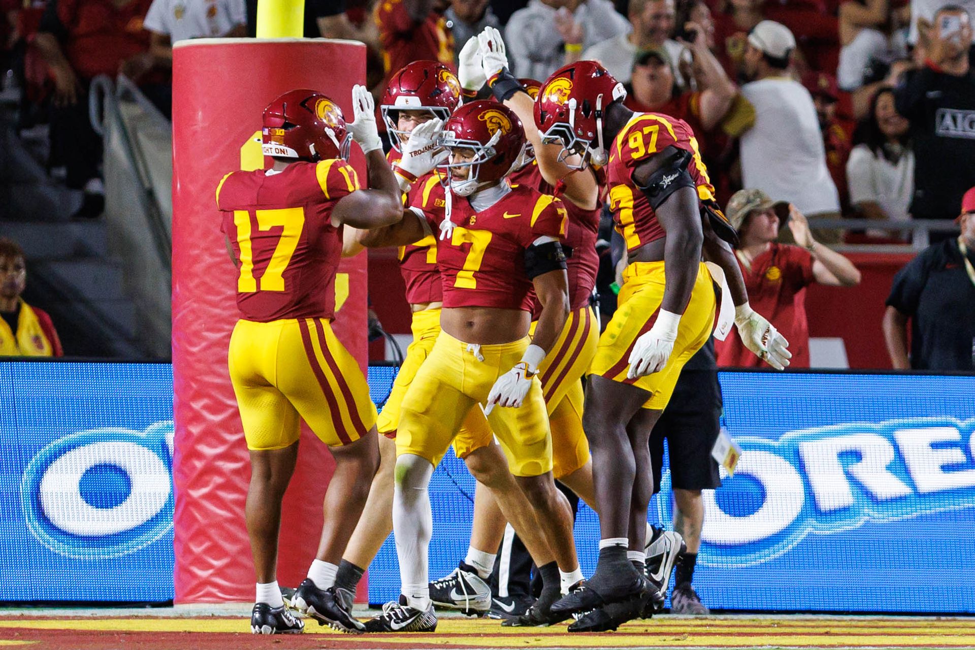 Alex Graham celebrates a safety with USC teammates