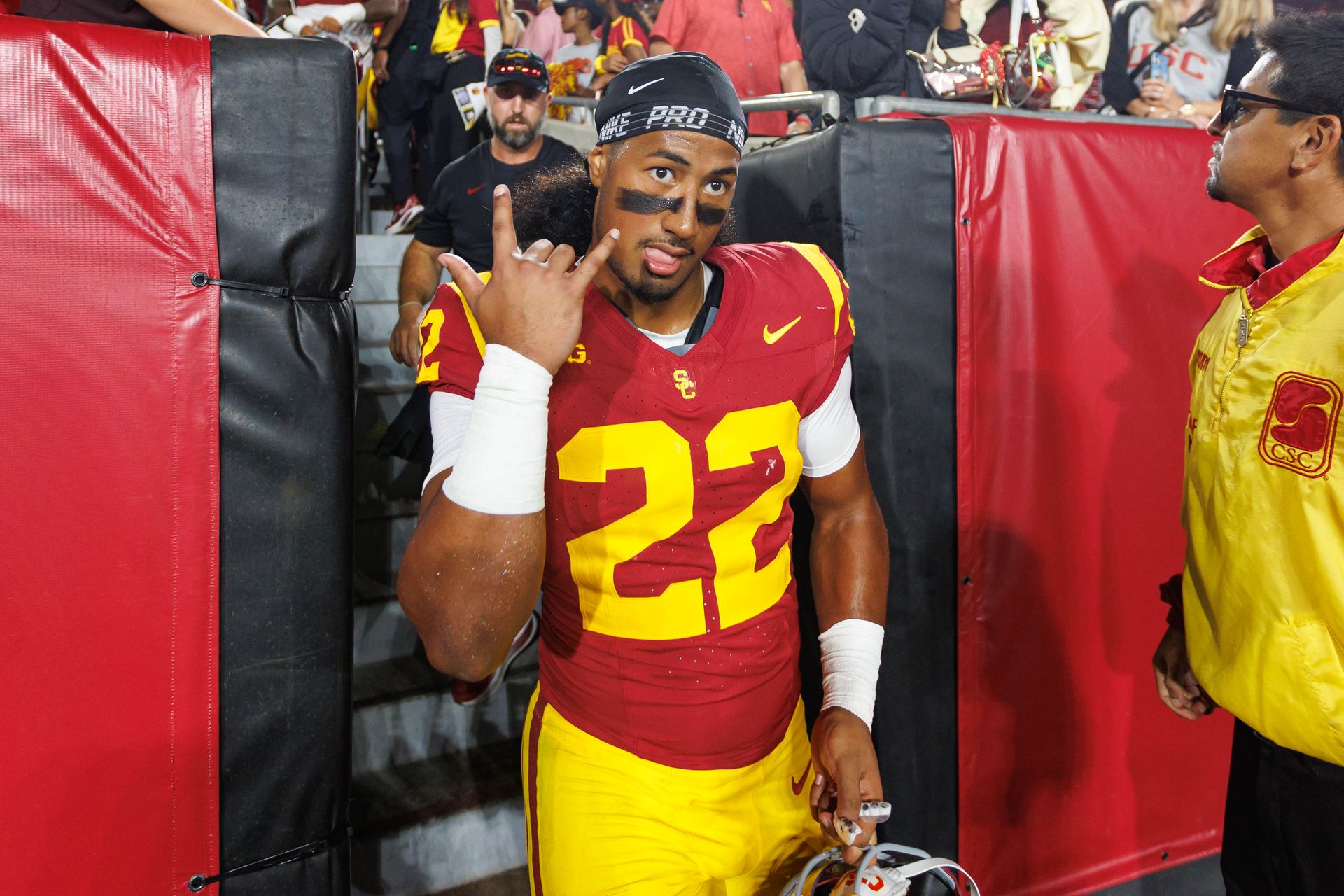 Talanoa Ili poses after the game for USC