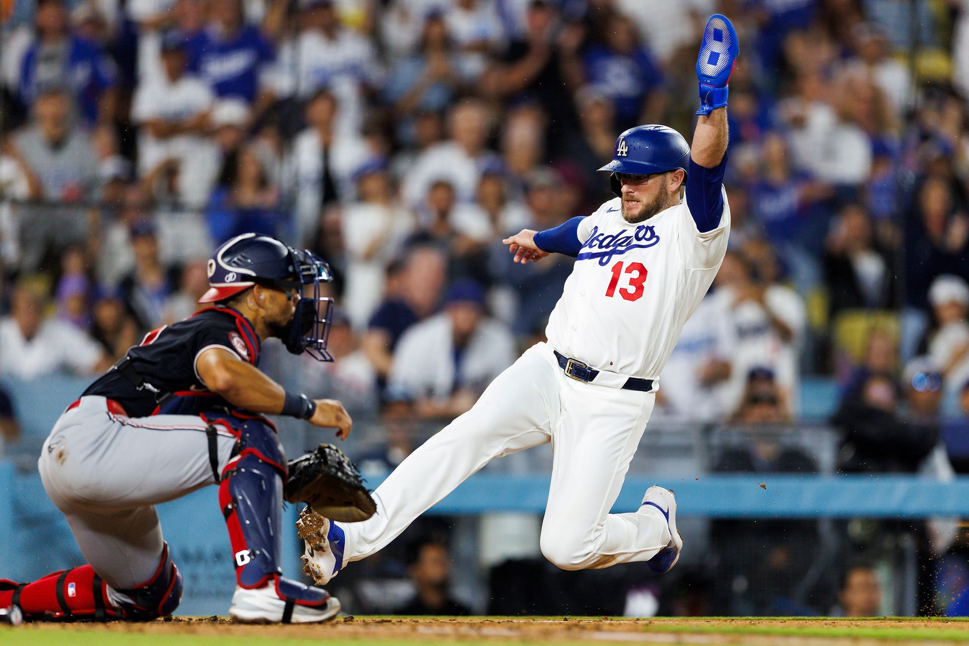 Max Muncy slides home, scoring for the Dodgers