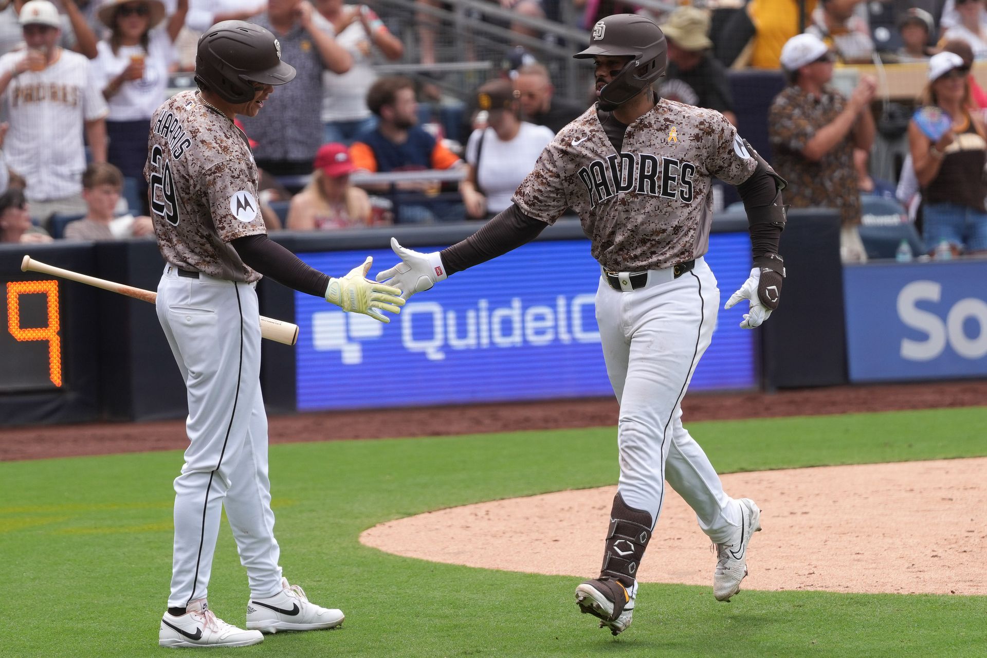 Campusano and Harris celebrate home run at Petco Park