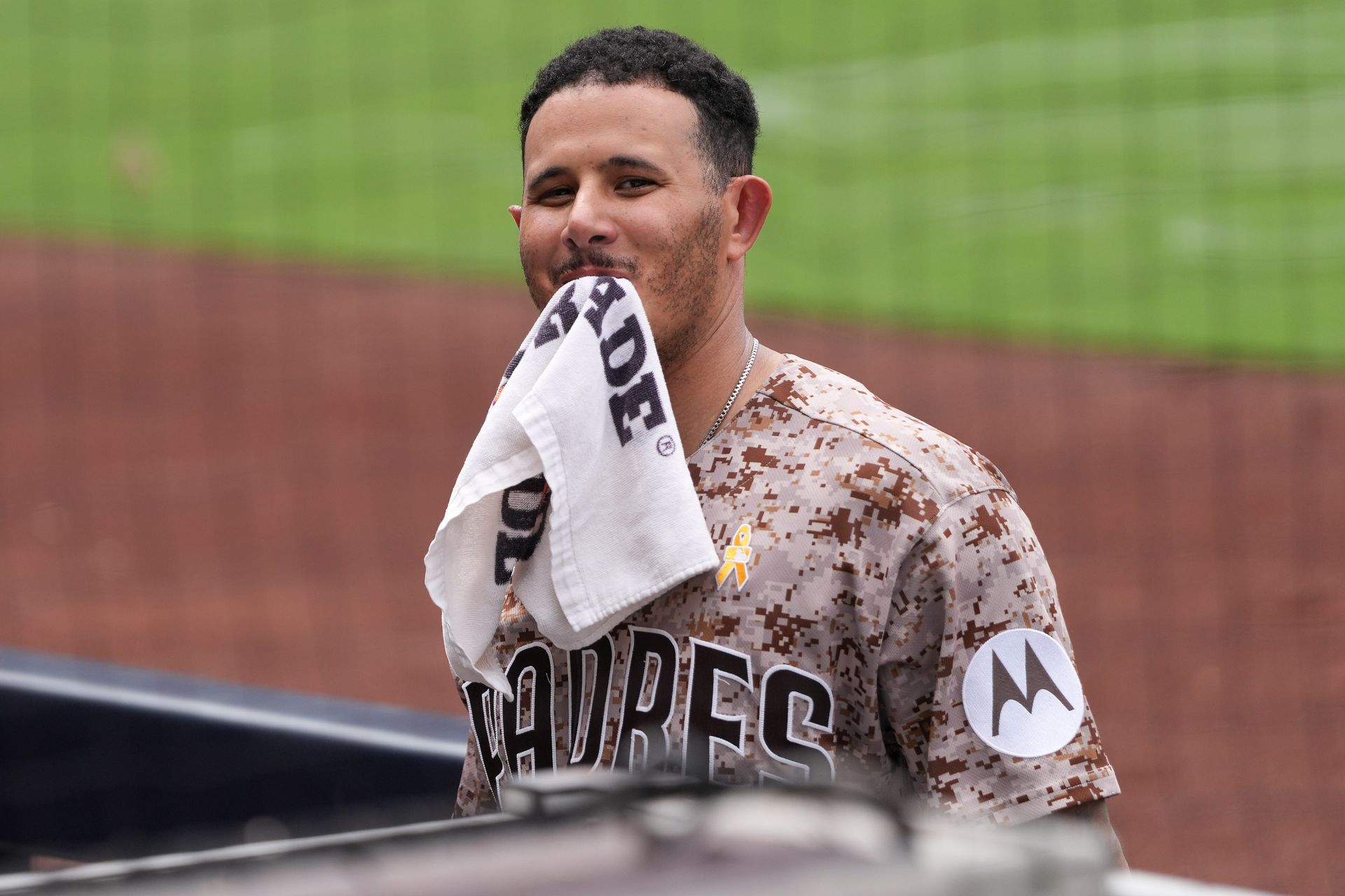 Manny Machado interacts with fans during the game