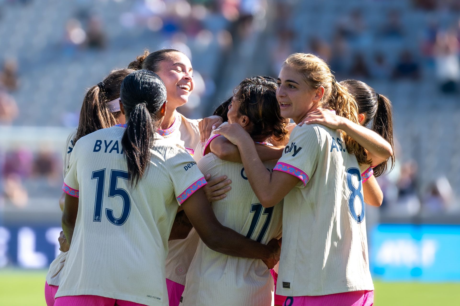 Gia Corley celebrates her goal with teammates