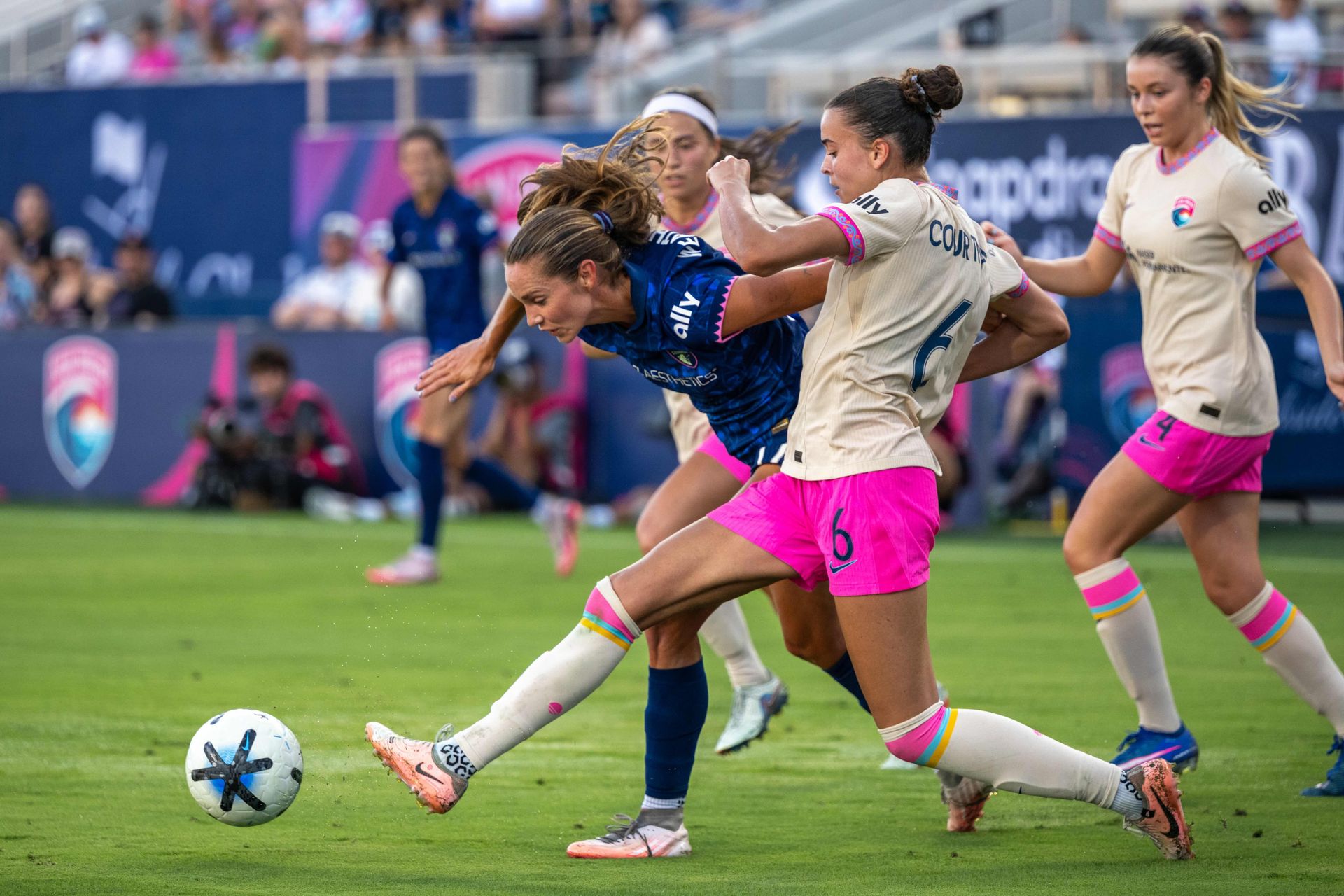 Brooklyn Courtnall steals the ball in NWSL action
