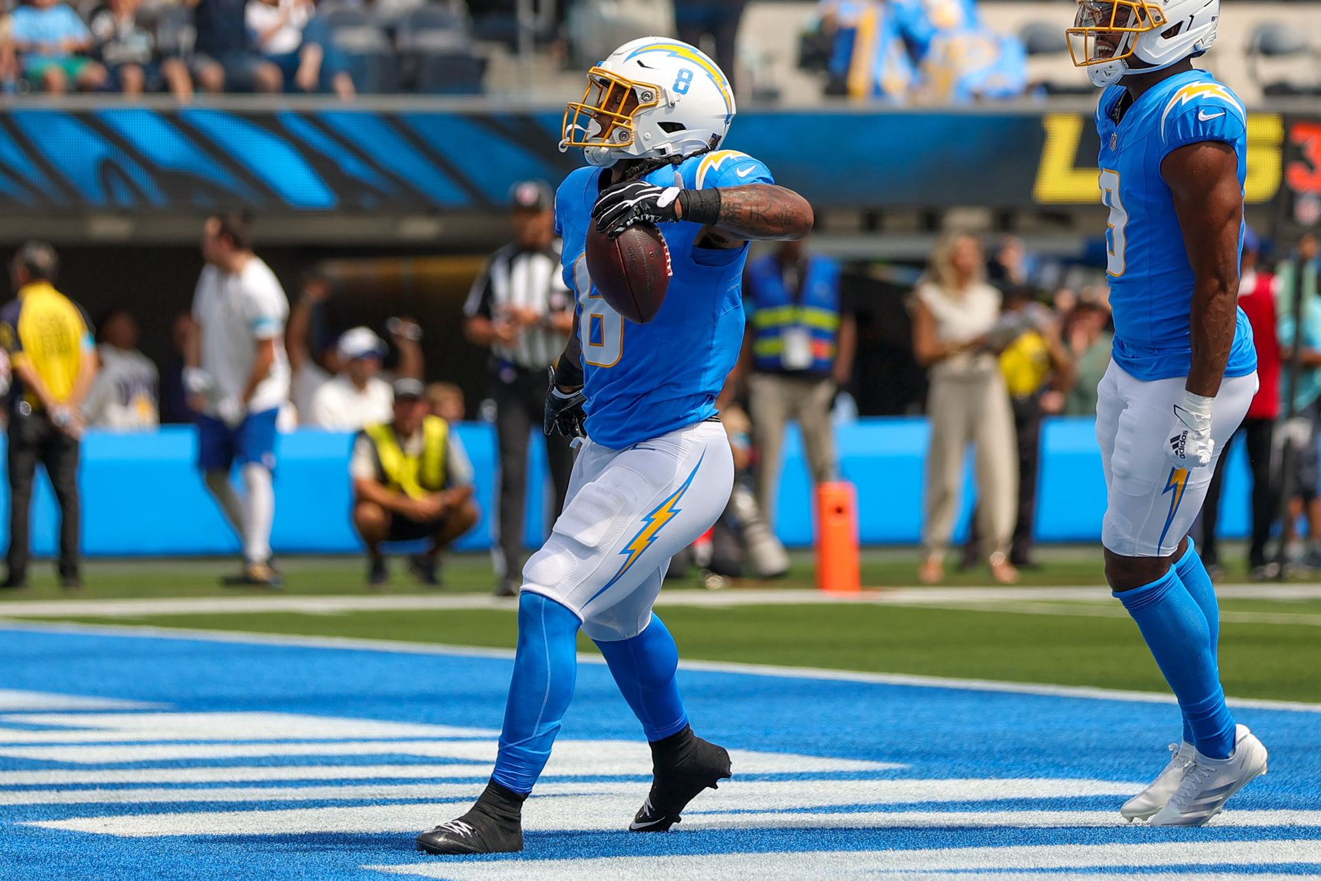 Omarion Hampton celebrates a touchdown for the Chargers