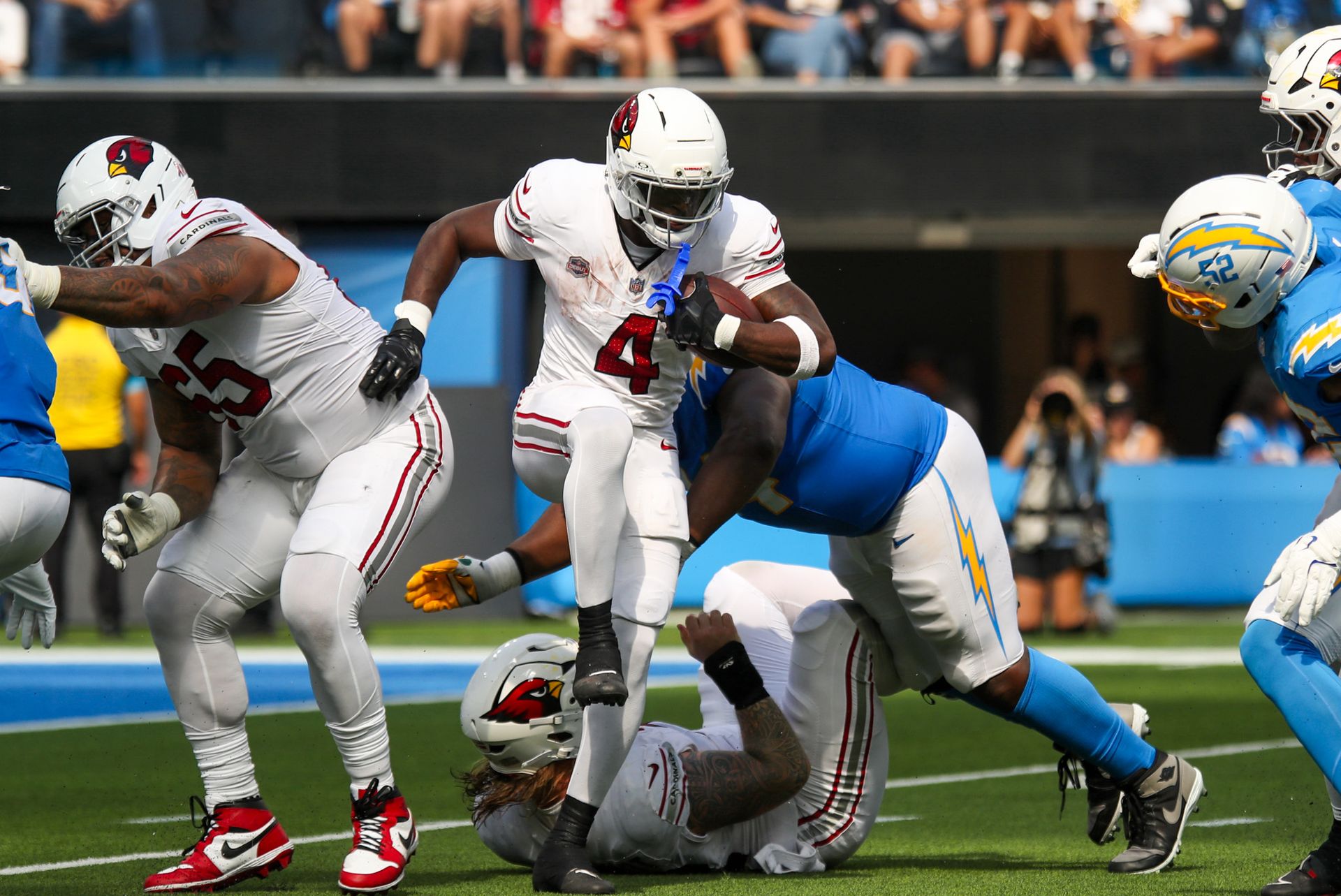 Jeremiyah Love runs the ball for the Cardinals