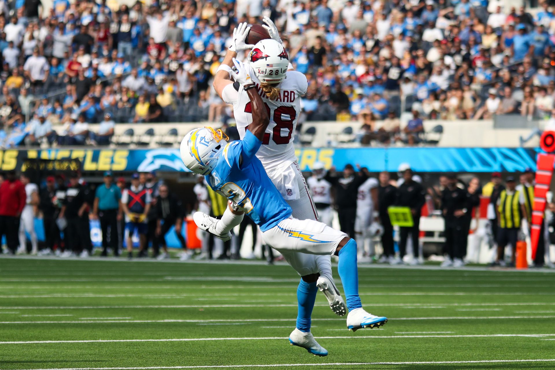 Andrew Wingard intercepts a pass against the Chargers