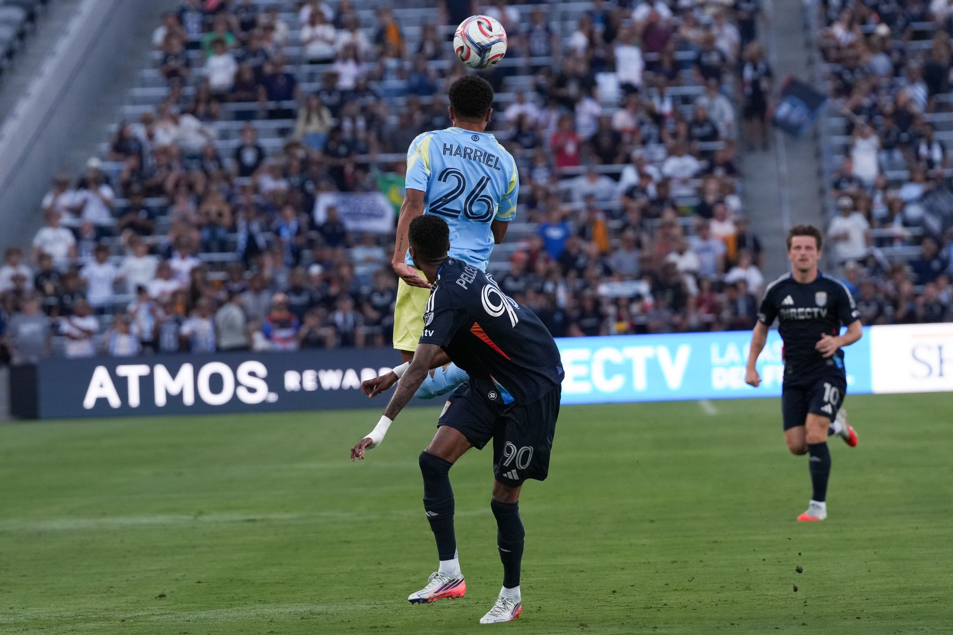 Nathan Harriel heads the ball in a game against San Diego FC