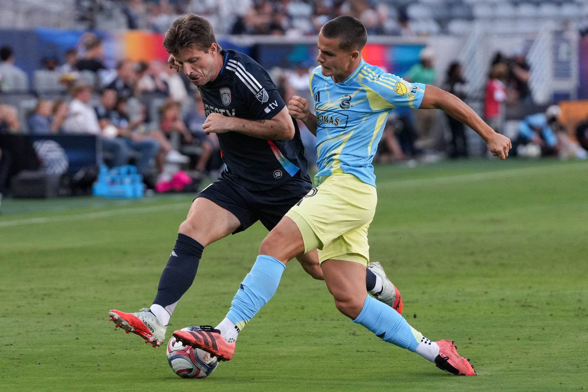Anders Dreyer and Cavan Sullivan fight for the ball in MLS action