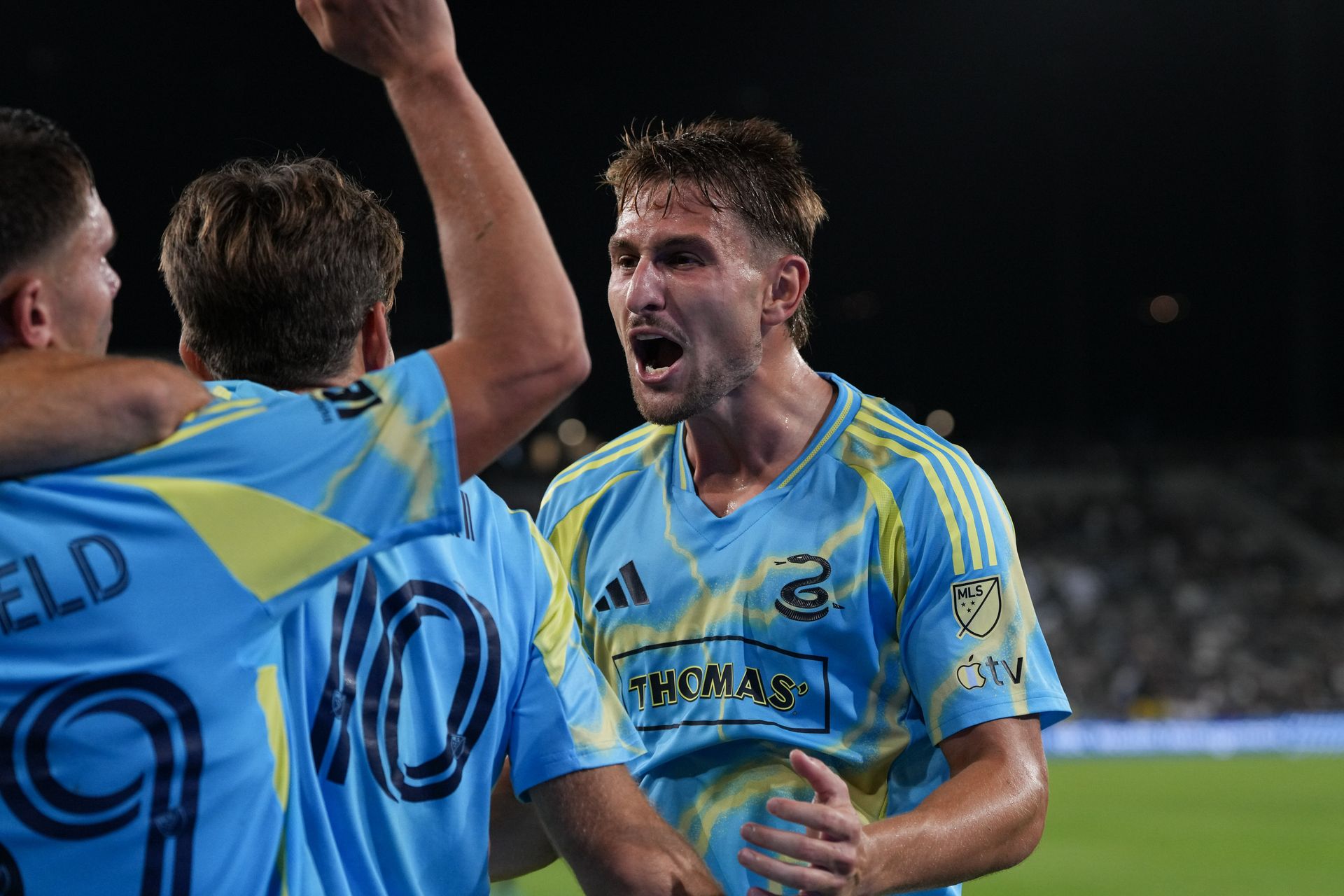 Bruno Damiani and teammates celebrate a goal in MLS