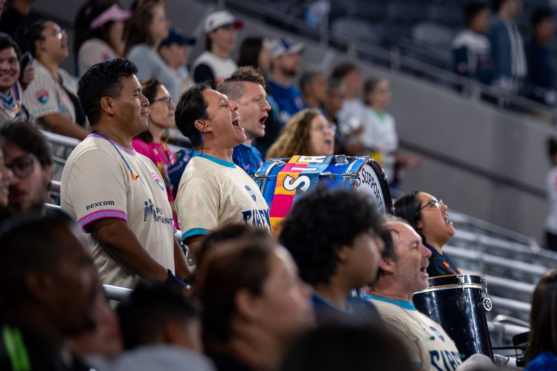 Wave FC fans cheer during a game against KC Current at Snapdragon Stadium.