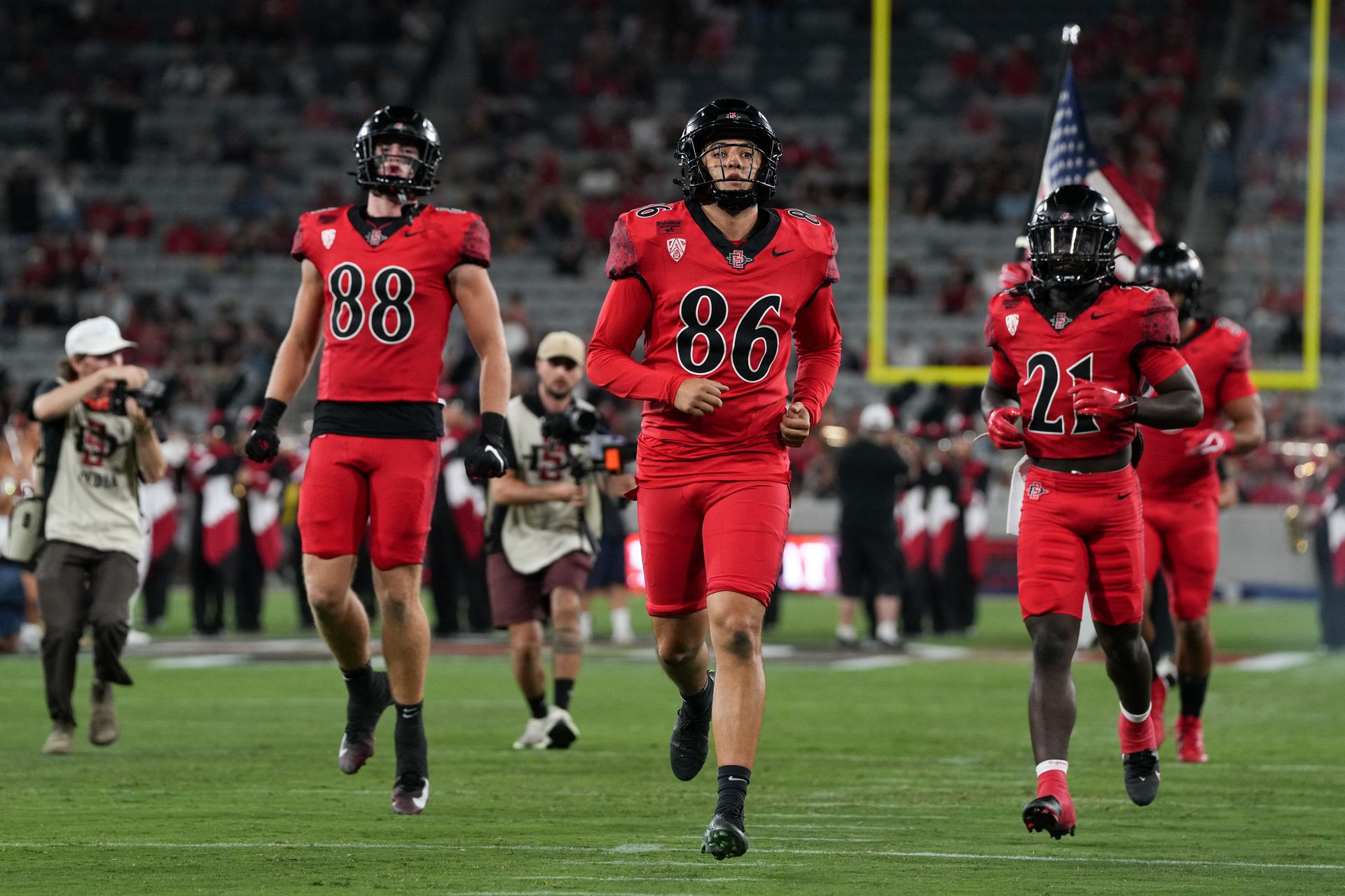 SDSU's Noah Serna and team enter the field at Snapdragon Stadium