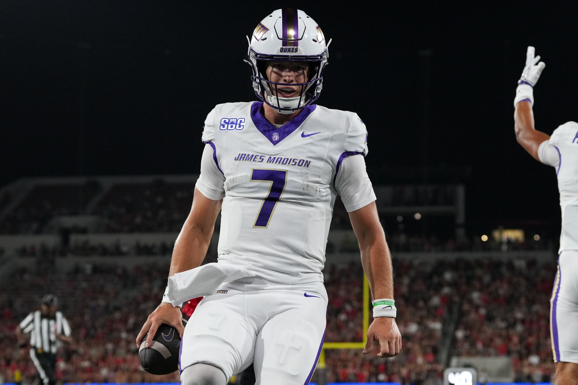 Camden Coleman celebrates a touchdown for JMU