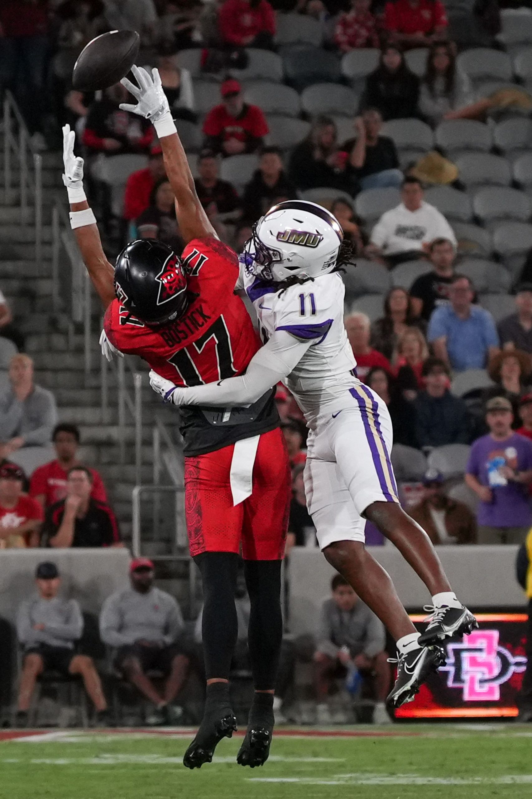 SDSU's Jacob Bostick attempts a catch against JMU