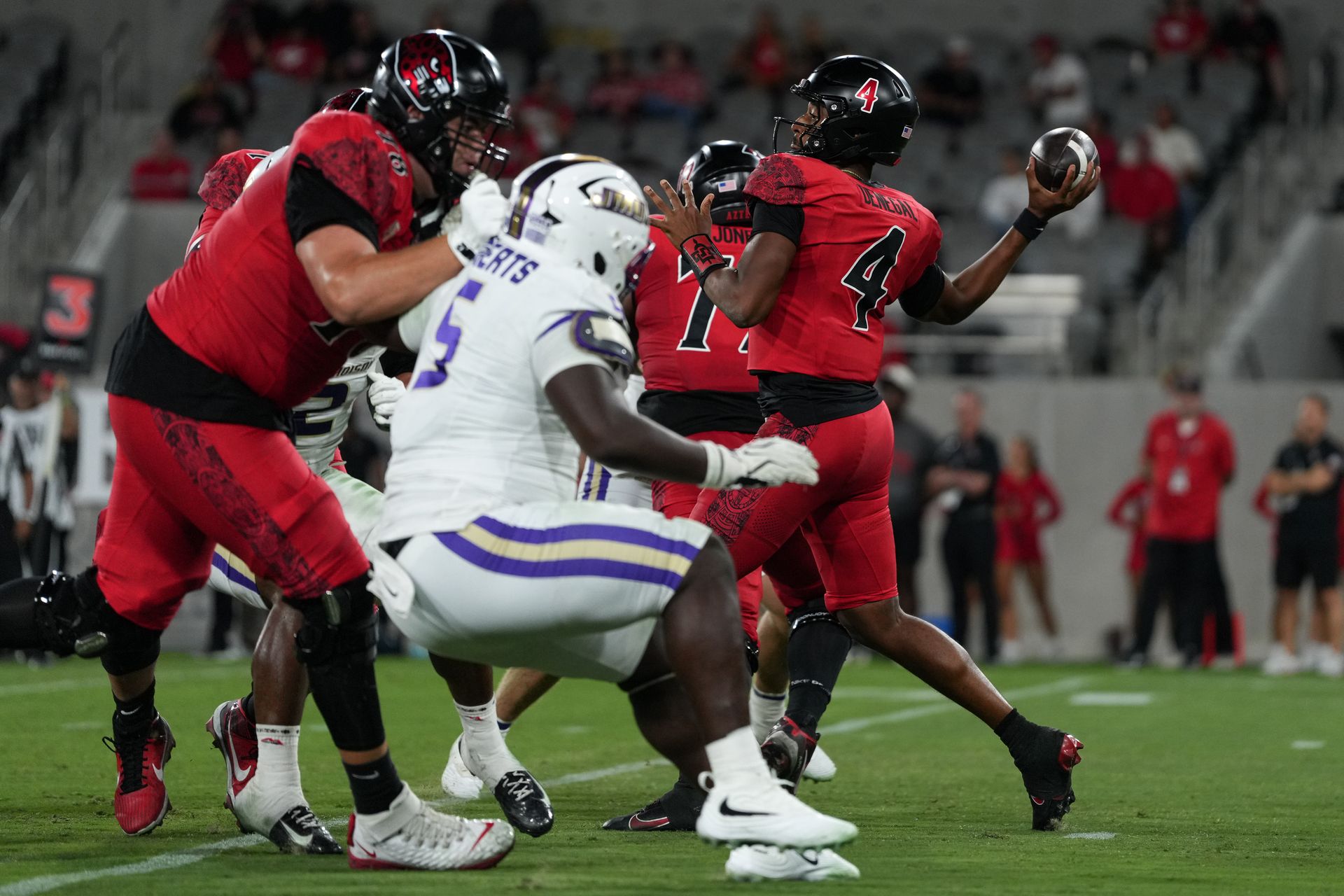 SDSU's QB Jayden Denegal throws against JMU