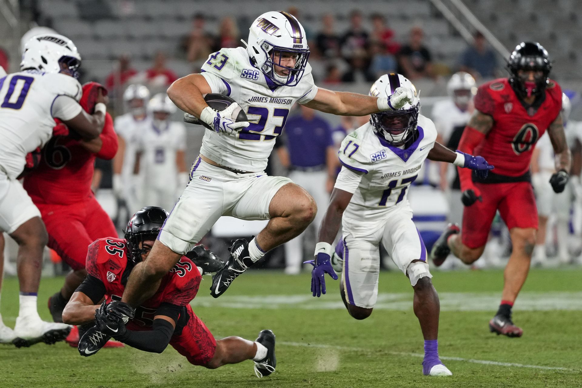 JMU's Nick Herman breaks through SDSU's defense