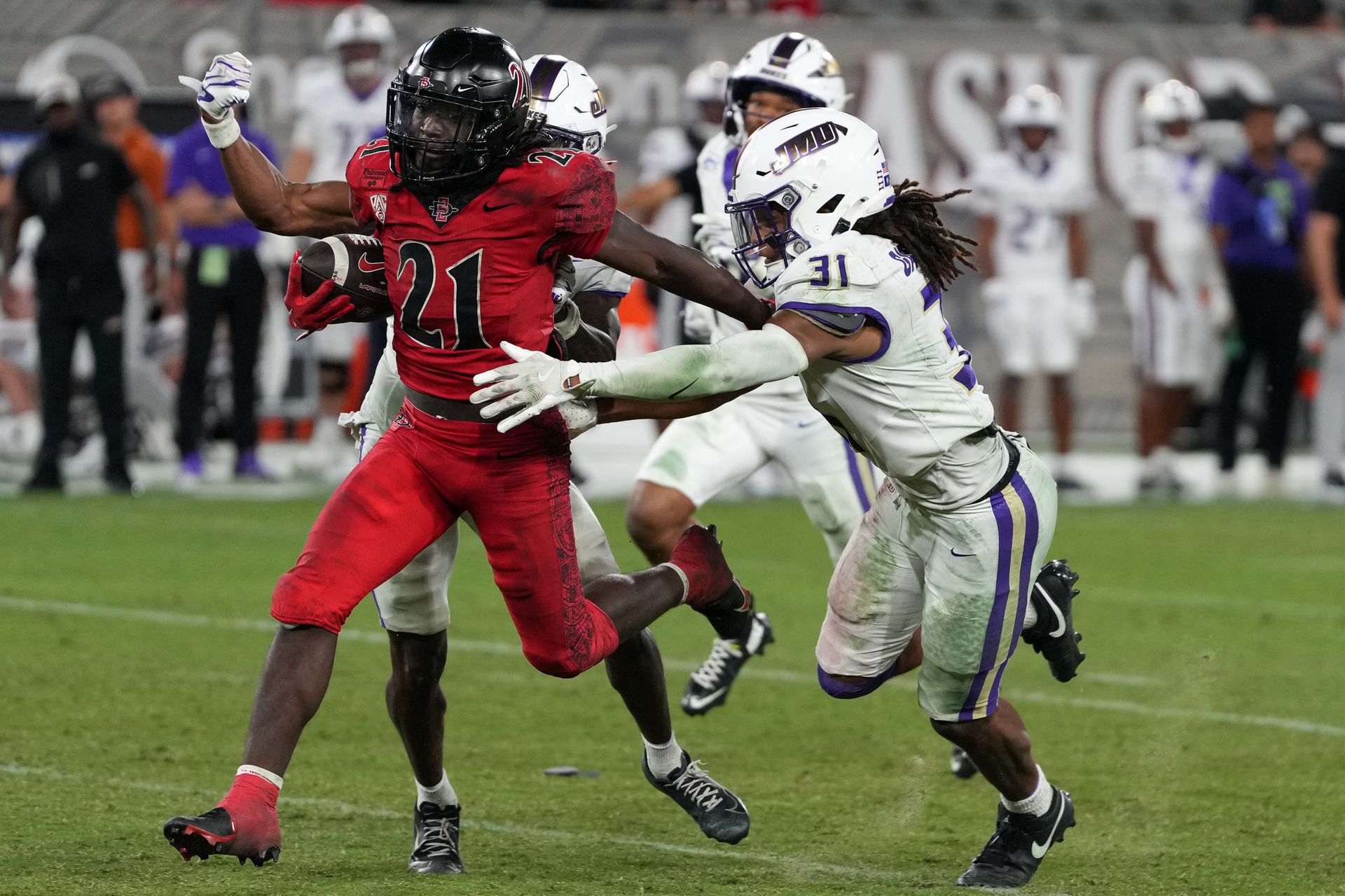 SDSU's Javion Kinnard runs against JMU