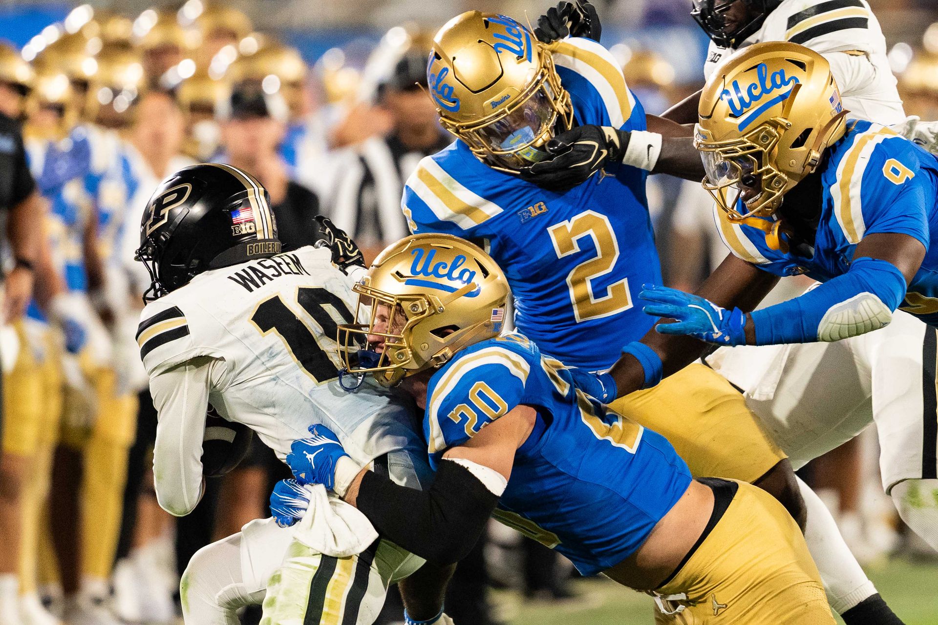 UCLA defense in action against Purdue, NCAA Football 2026