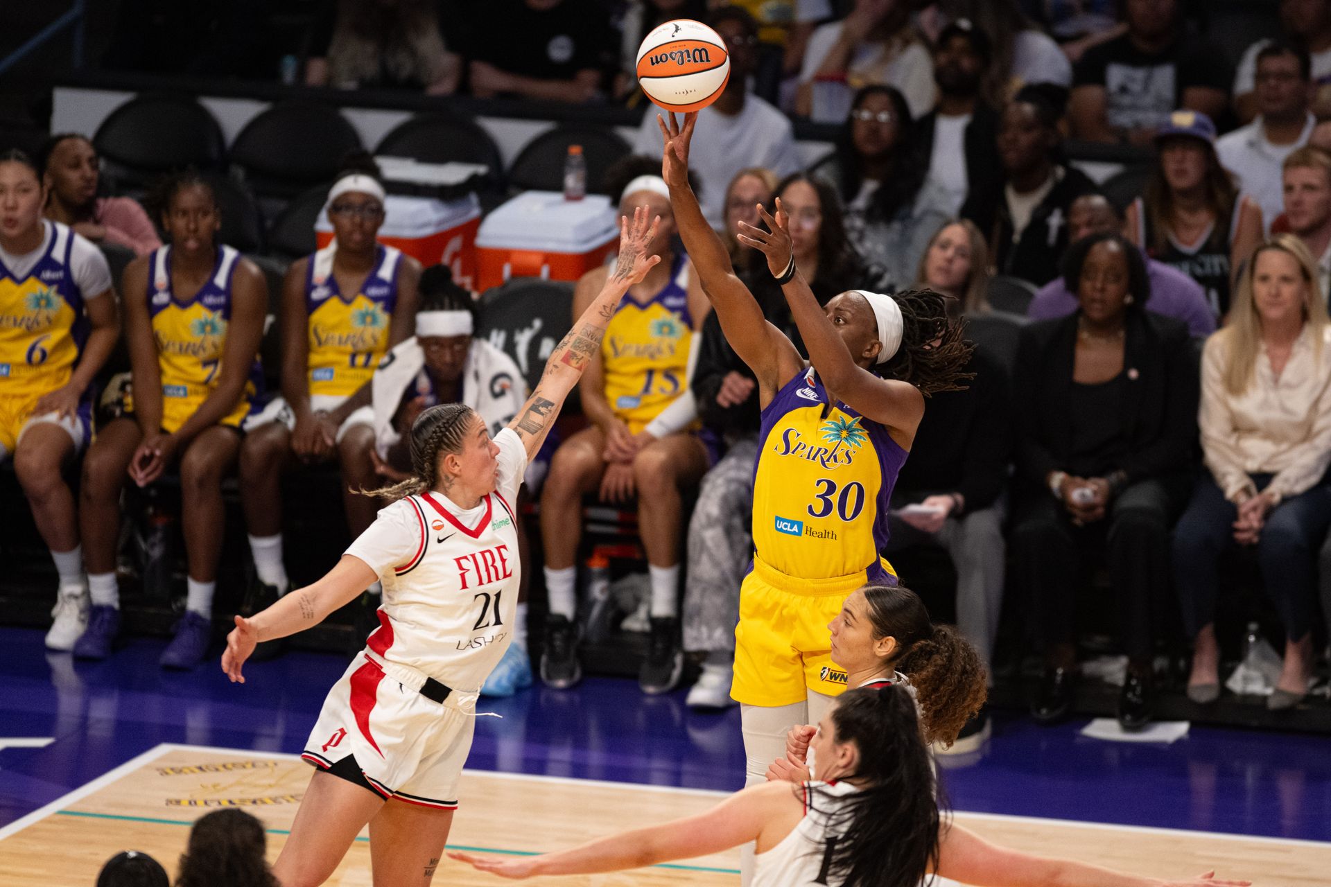 Nneka Ogwumike takes a jumper in a WNBA game.