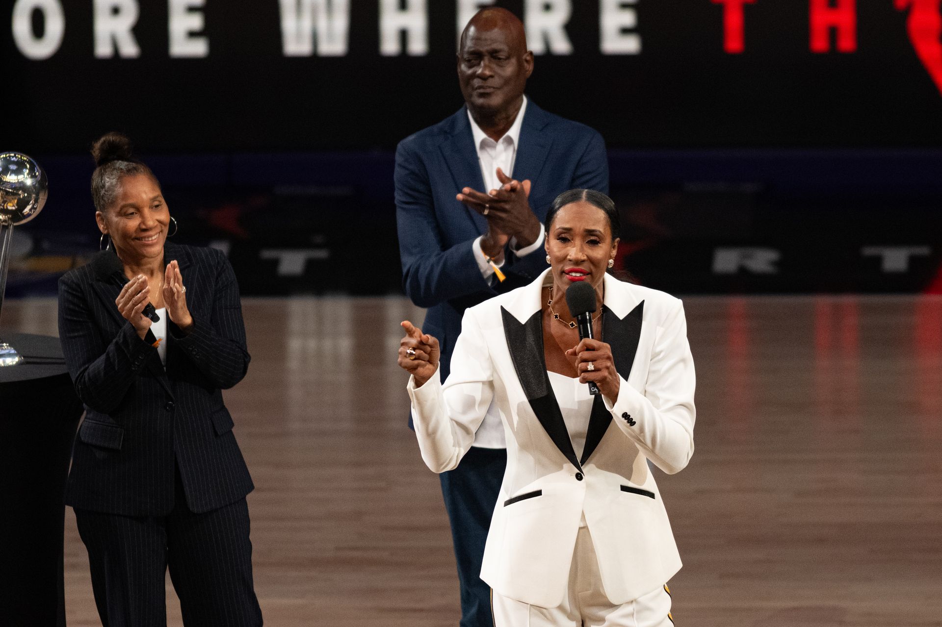 Lisa Leslie speaks at her statue unveiling at halftime.