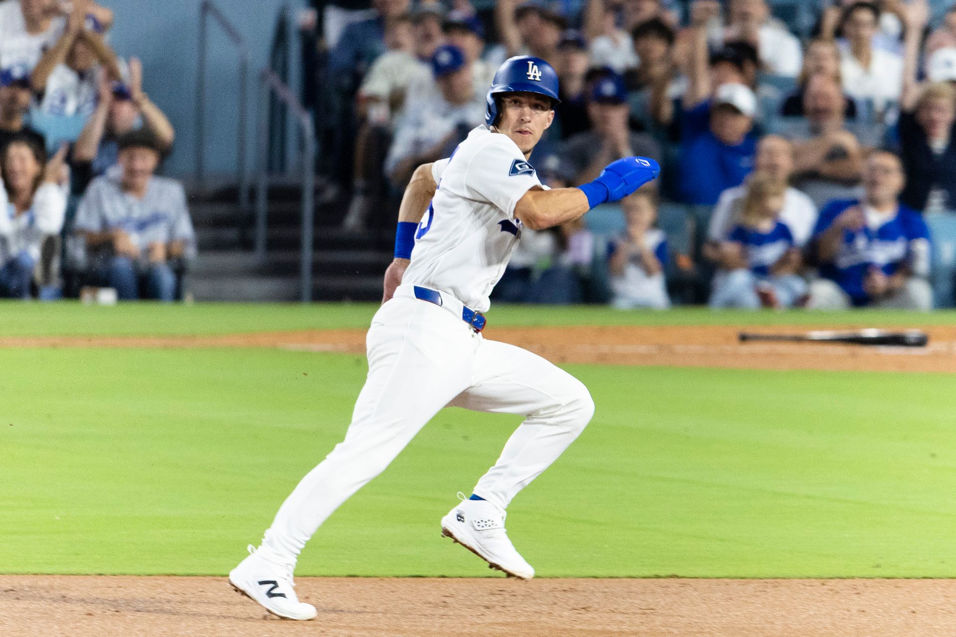 Tommy Edman (25) running bases in Dodgers vs. Padres matchup.