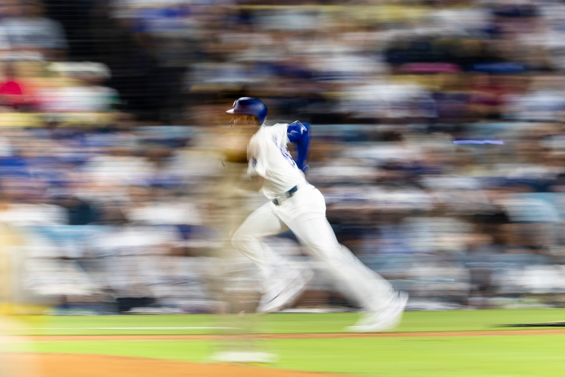 Josue De Paula (95) races to first base in Dodgers' game.