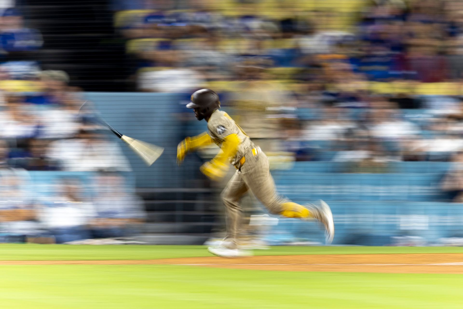 Samad Taylor (0) runs to first base in game against Dodgers.