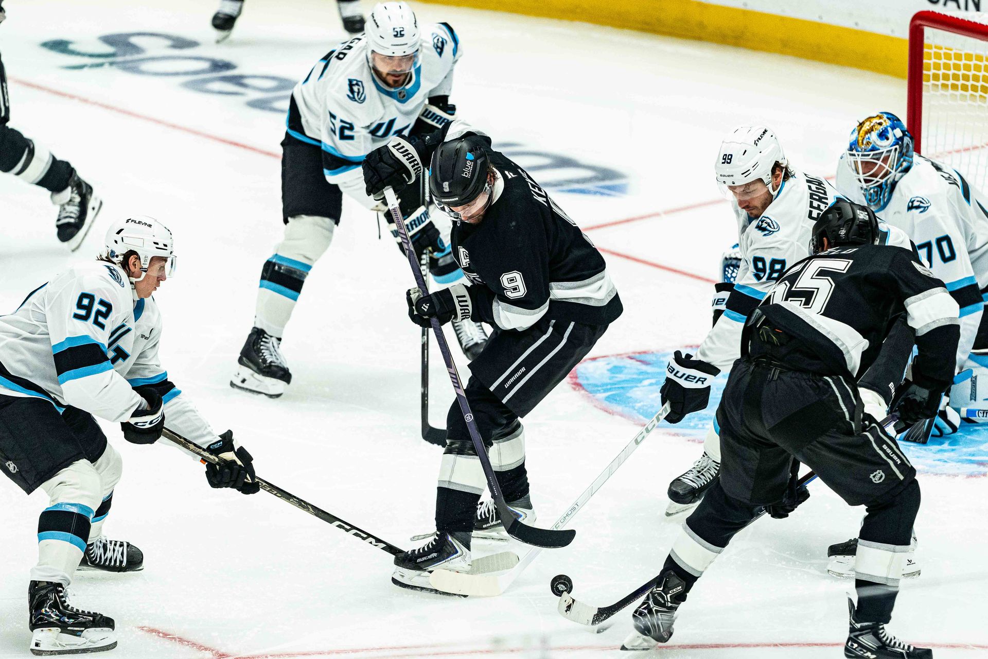 Adrian Kempe fights off defense vs. Utah Mammoth, Sep 22, 2026
