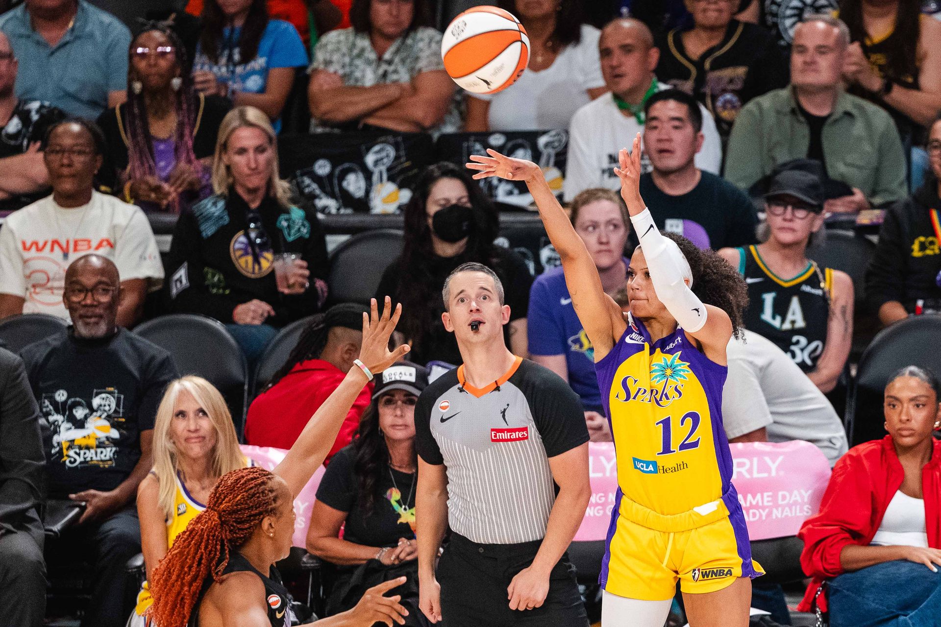 Rae Burrell takes a shot in a WNBA game