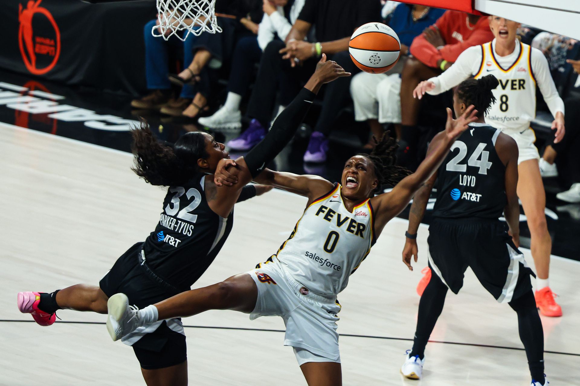 Cheyenne Parker-Tyus blocks Kelsey Mitchell in WNBA Playoff opener