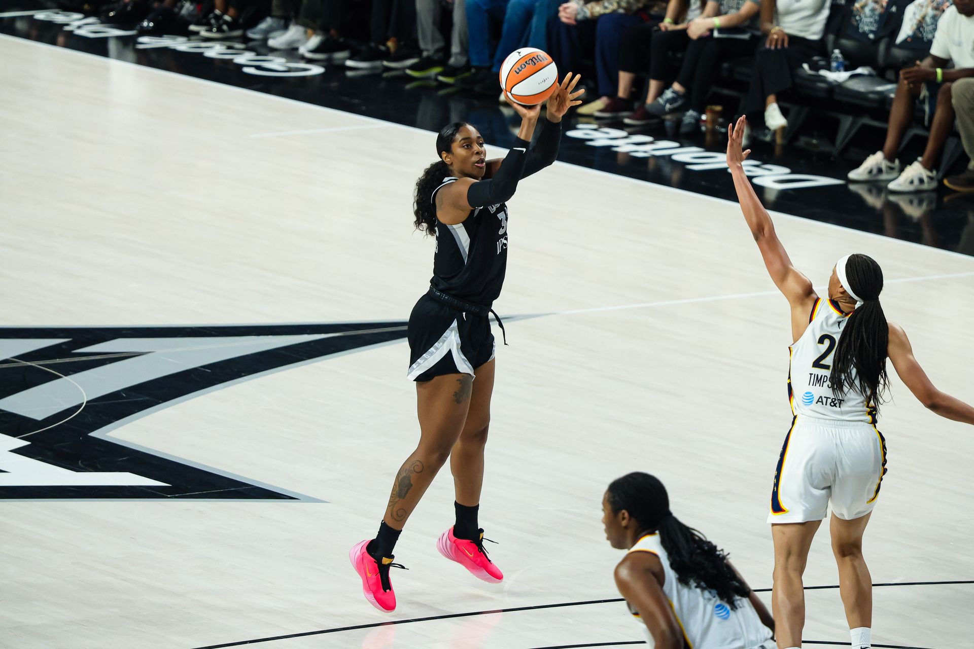 Cheyenne Parker-Tyus hits a three-pointer in WNBA Playoff game