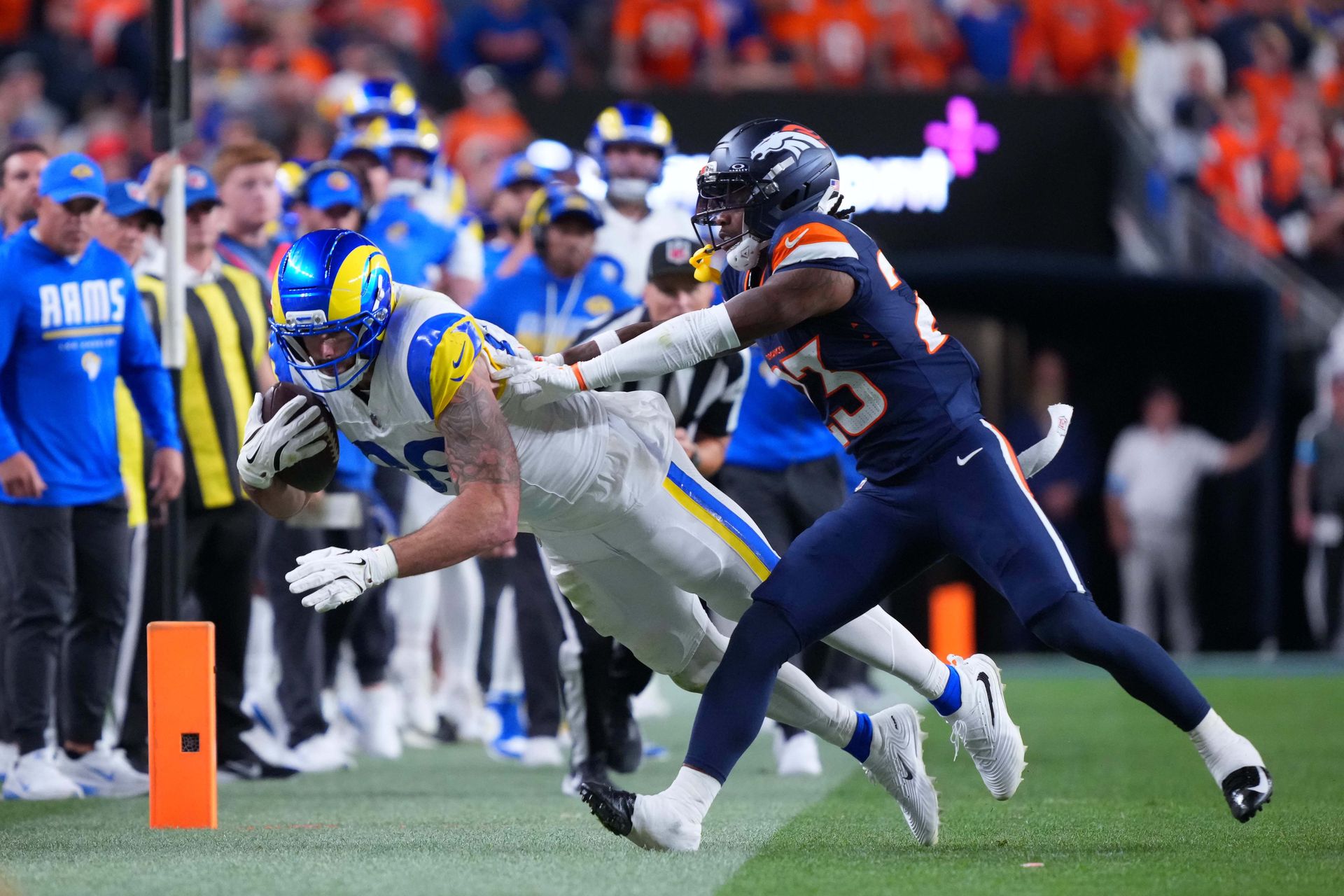 Tyler Higbee catches during the NFL game