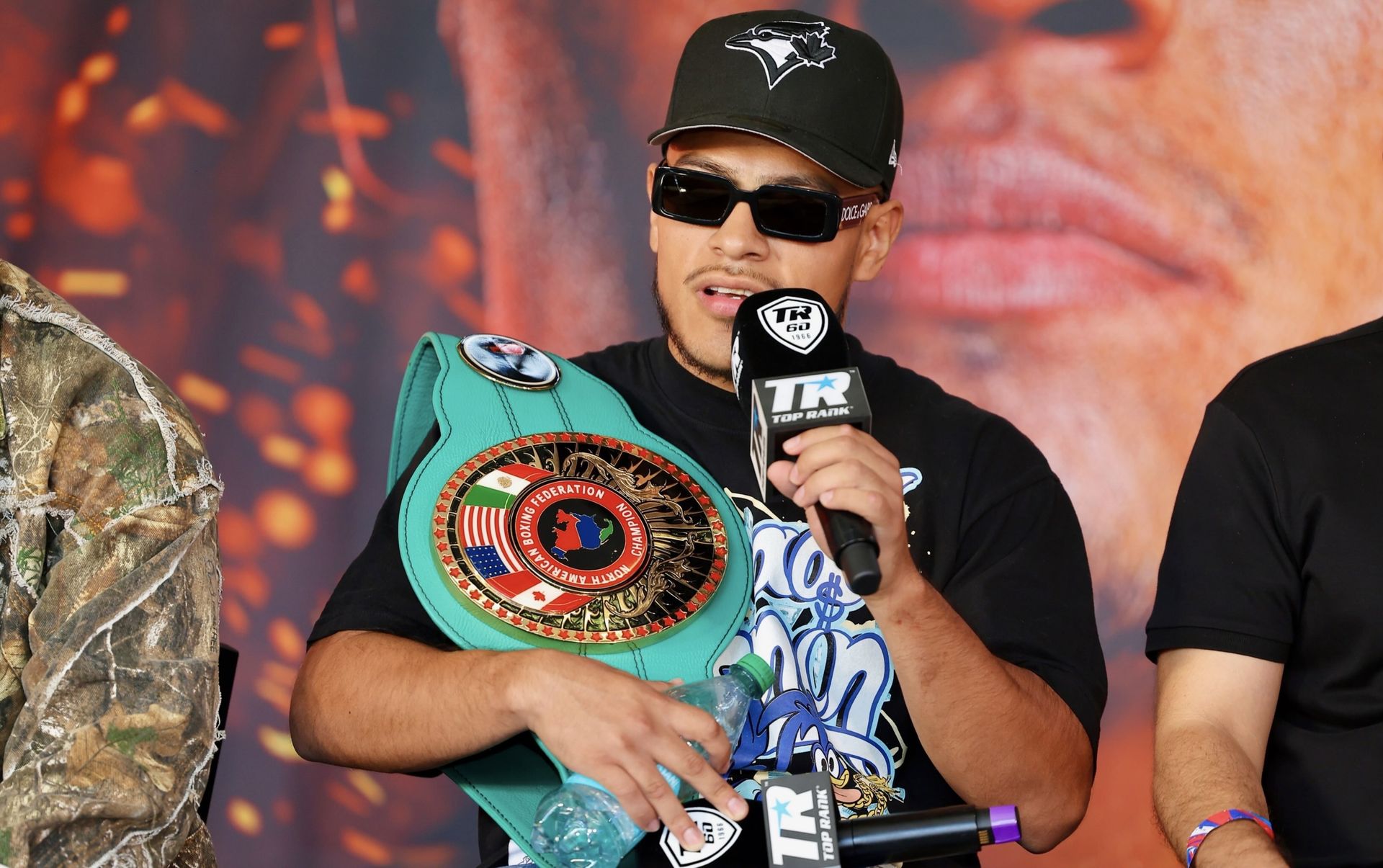 Albert Gonzalez with NABF title at press event