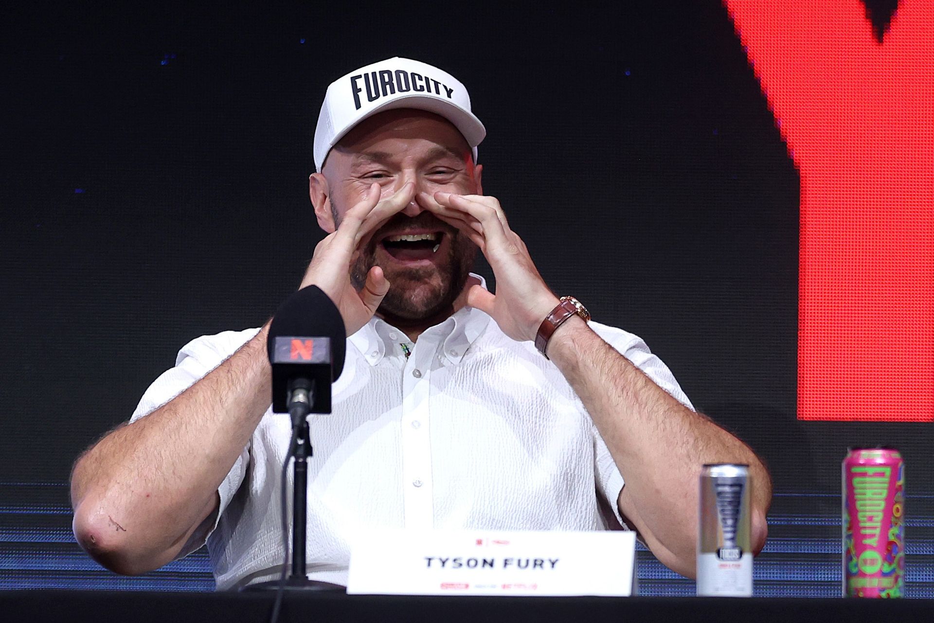 Tyson Fury engages with the crowd at the London press conference.